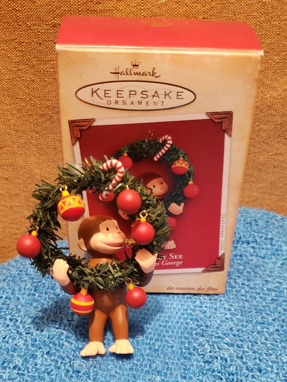 Hallmark Curious George Ornament with Green Wreath and Red Ornaments